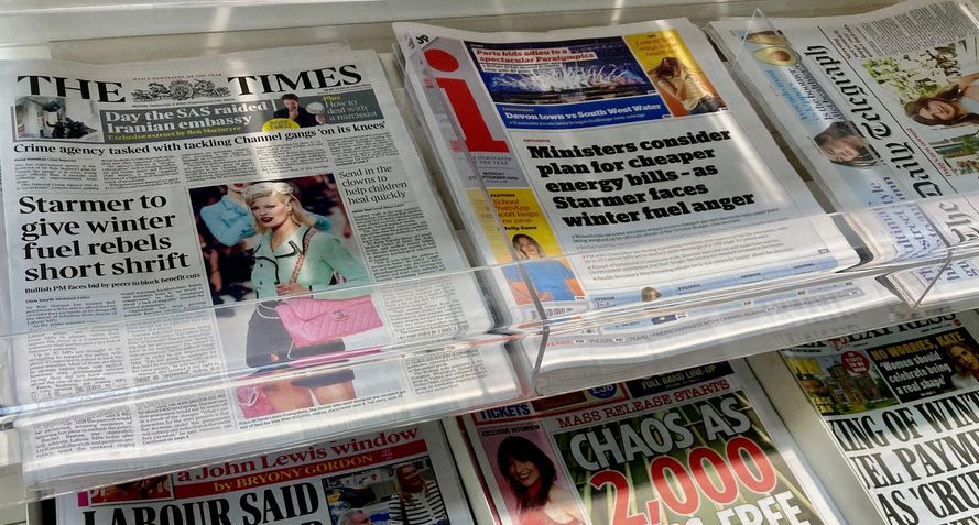 Newsstand with various newspapers